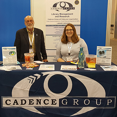 Photo of Staff at Cadence Group Conference Booth.