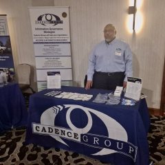 Cadence Group employee tabling at GRA Conference
